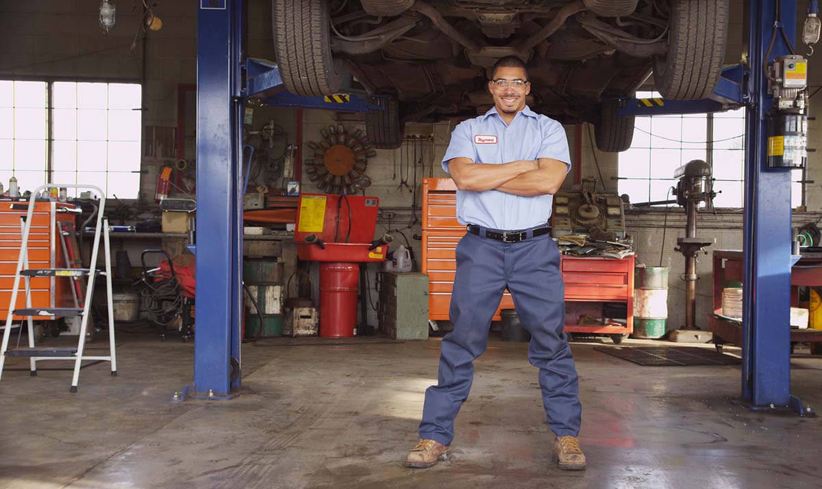 garage owner in his repair shop