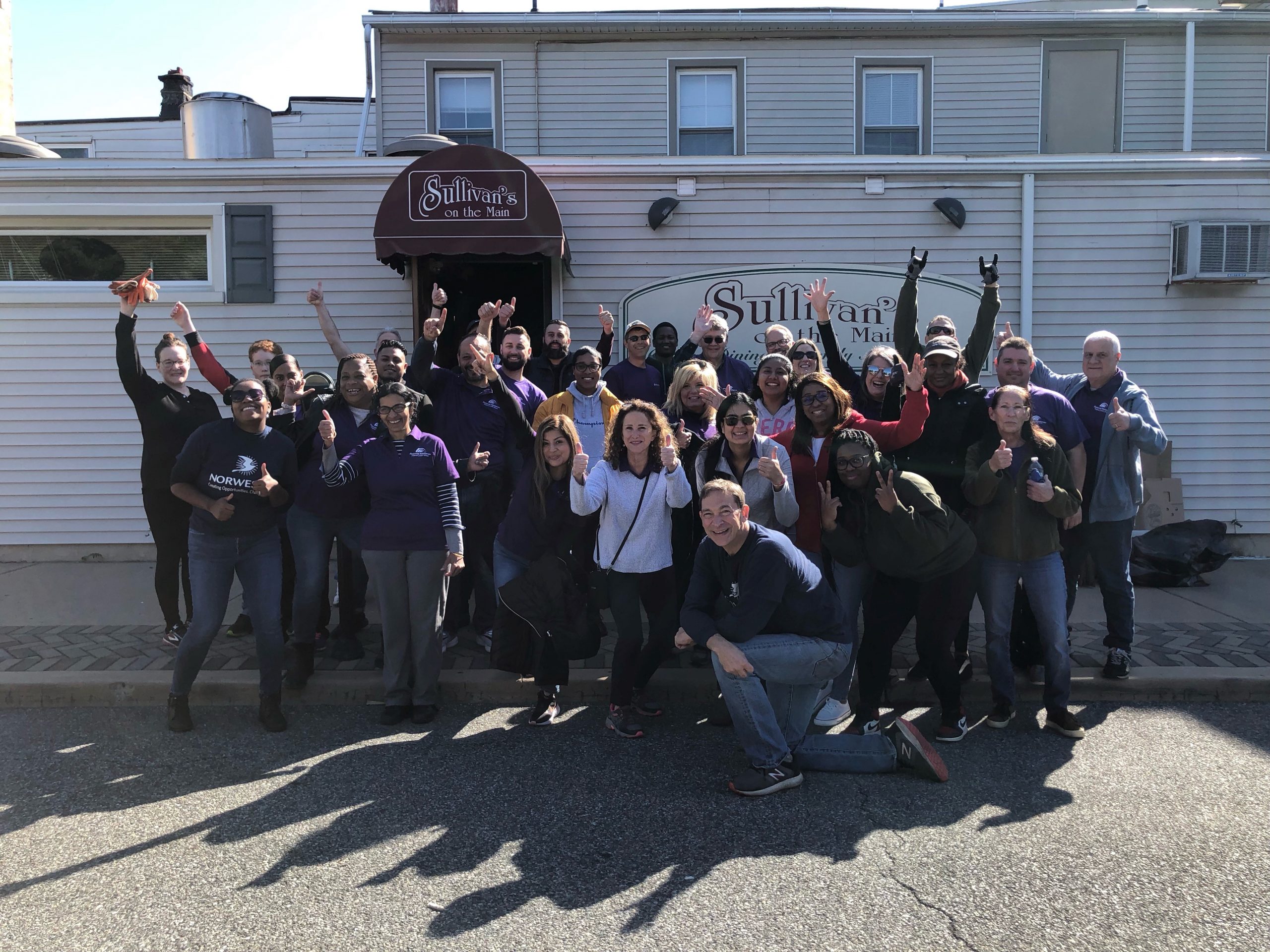 group of FRFCU employees volunteering with clean up