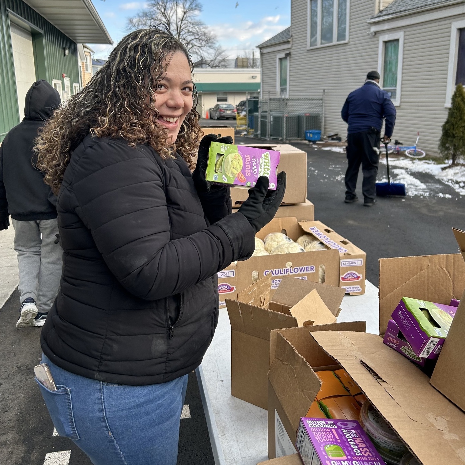 happy woman distributing food
