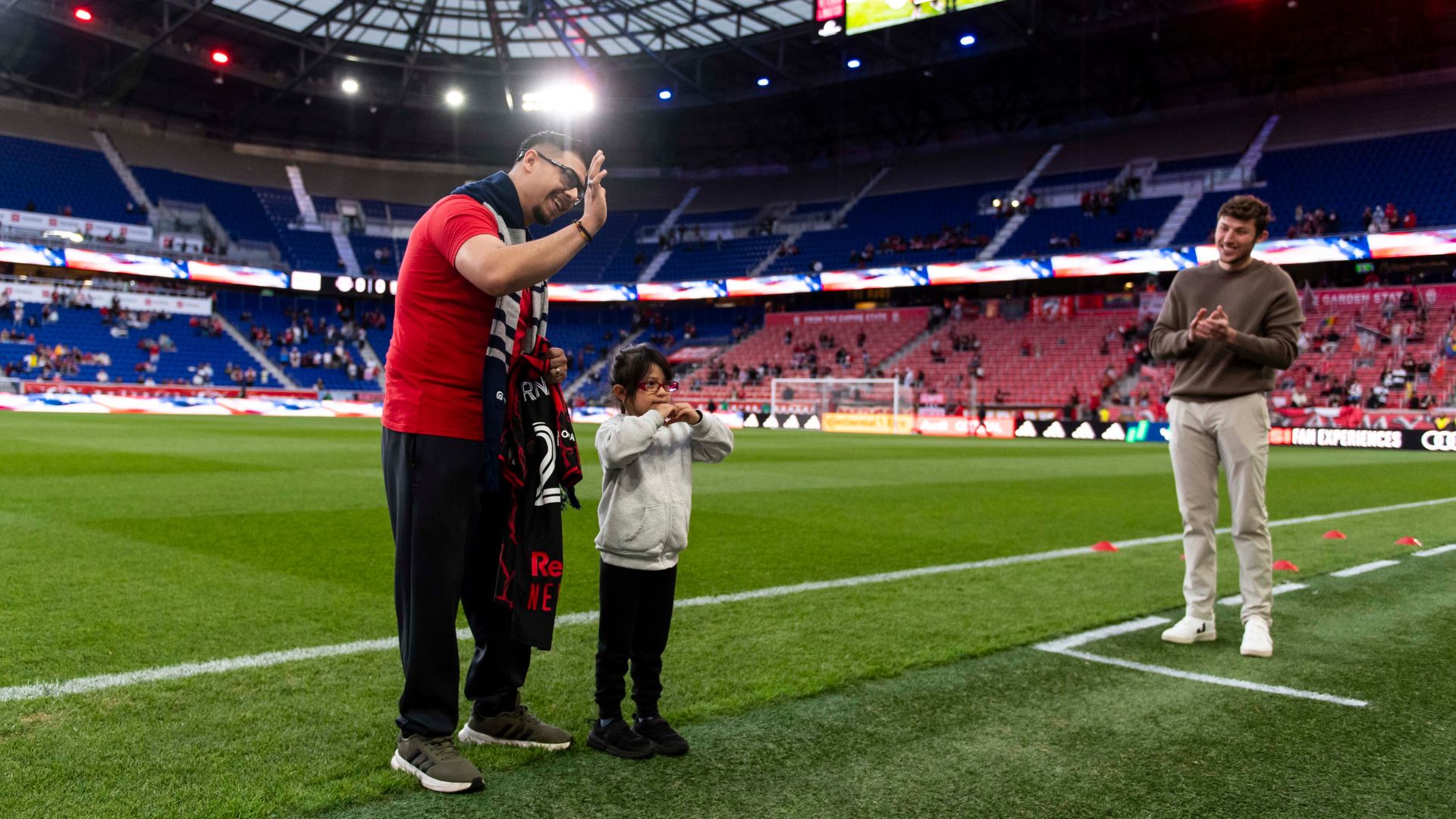 Parent and child on the field
