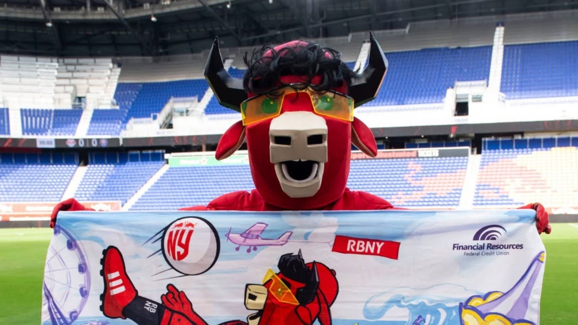 RBNY Mascot holding FRFCU towel